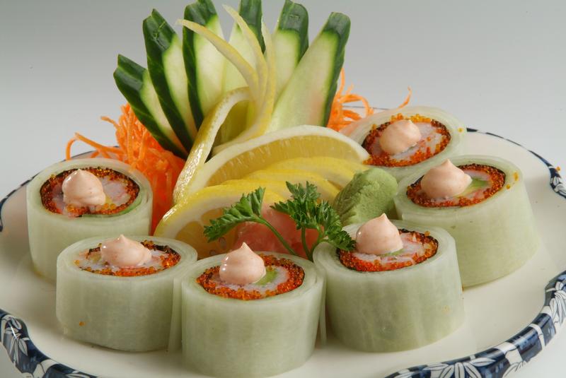 Salmon roe, & avocado wrapped in a cucumber wrapping, topped with spicy sauce